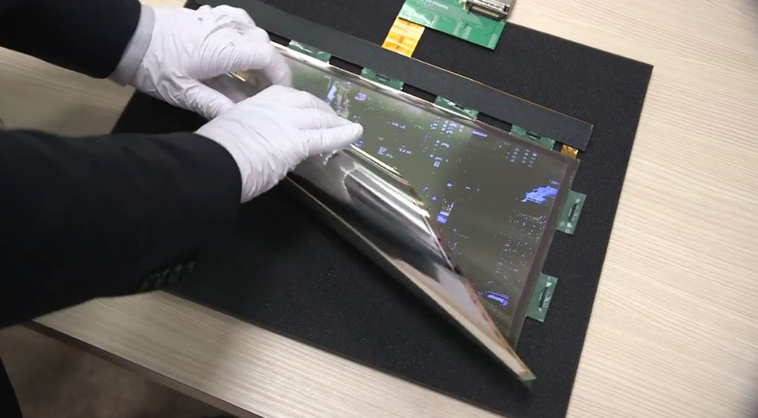 Soon you may FOLD your TV like a newspaper and take it to office