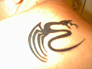 Tribal Dragon Tattoo on Male Back
