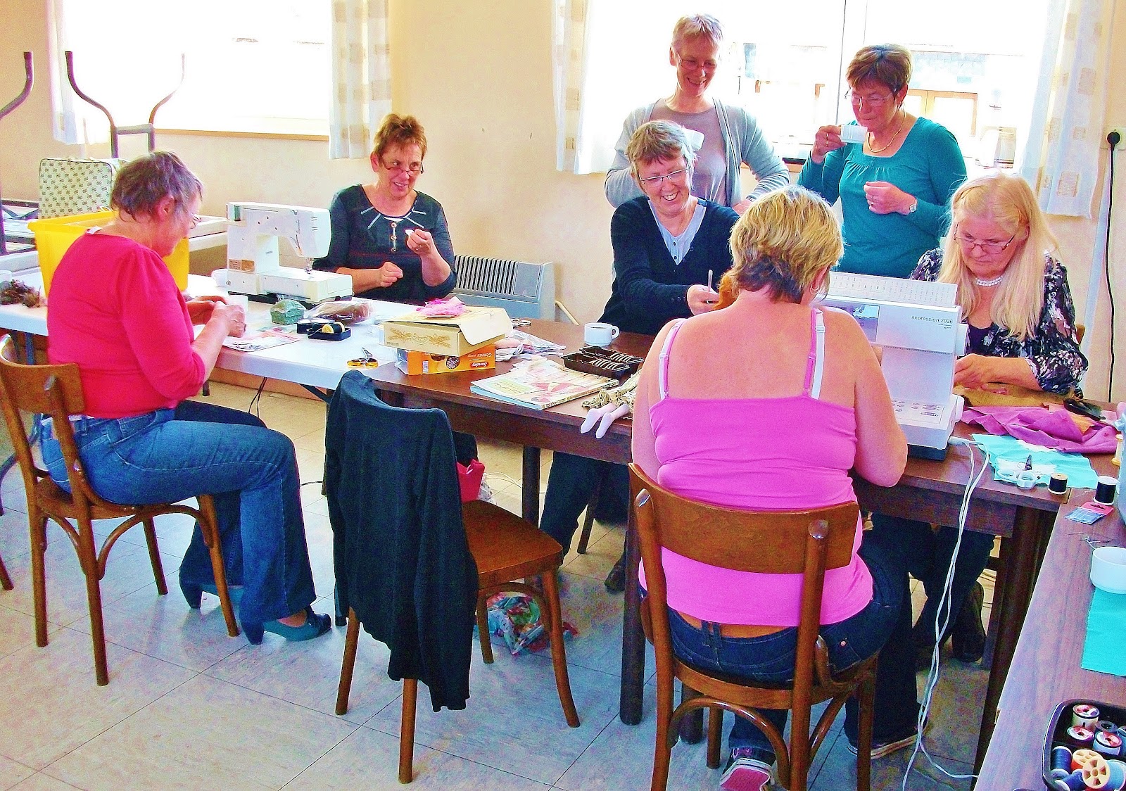 Boisfleurie The thursday sewing group and their cloth dolls.