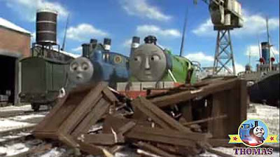 Steam locomotive Henry the green engine trapped by large wooden shipping crate smashed on the tracks