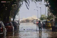 http://sciencythoughts.blogspot.co.uk/2014/06/flooding-after-mumbai-hit-by-freak-waves.html