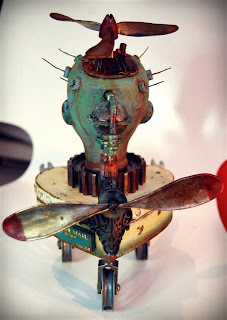 Andy skinner altered doll flying machine