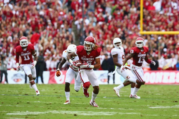 Zack Sanchez #15 of the Oklahoma Sooners returns a pass interception for a touchdown against the Texas Longhorns at Cotton Bowl on October 11, 2014 in Dallas, Texas. (October 10, 2014 - Source: Ronald Martinez/Getty Images North America) 