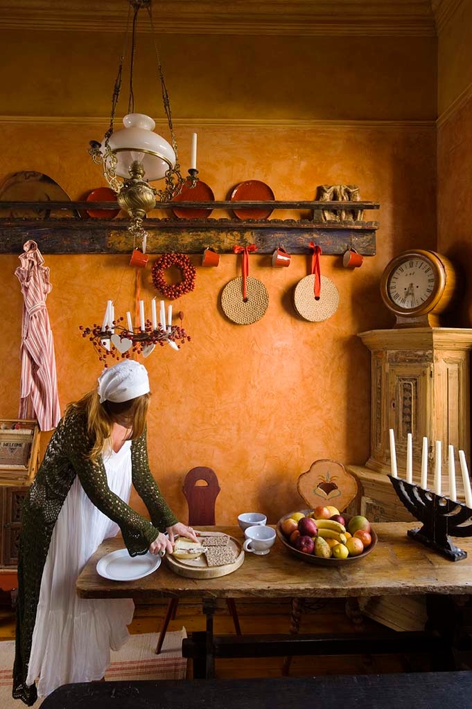 Madeleine Lee in her stunning antique swedish themed kitchen