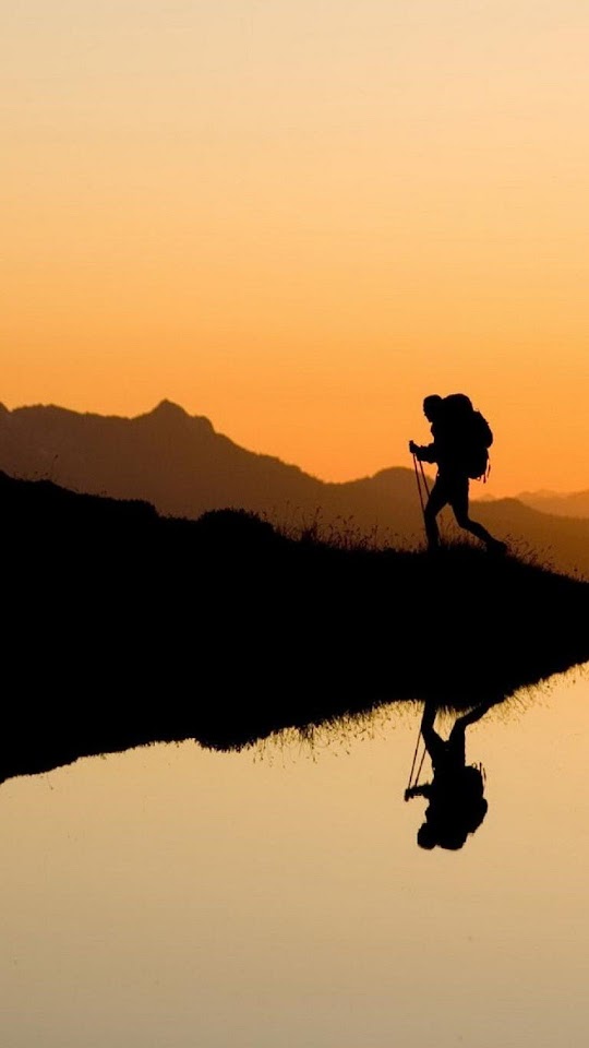 Explorer Silhouette In The Sunset Android Wallpaper