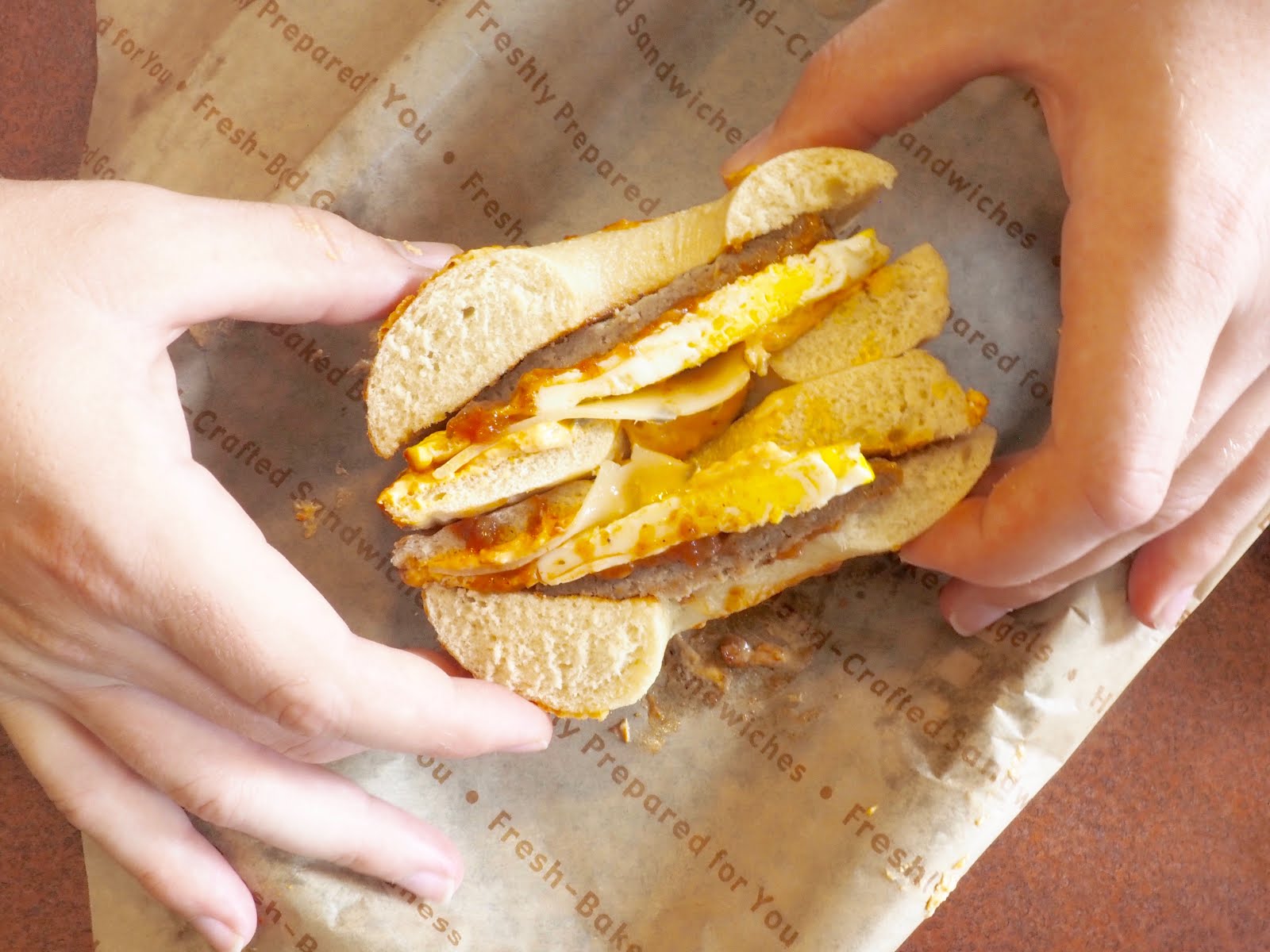 Einstein Bros Bagels Applewood Bacon & Cheddar Egg Sandwich IUCN Water