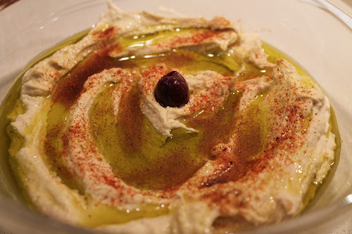 Smooth hummus with smoked olive oil