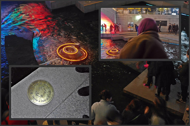 tossing coins into the wishing well. Seoul Lantern Festival 2015 | www.meheartseoul.blogspot.sg