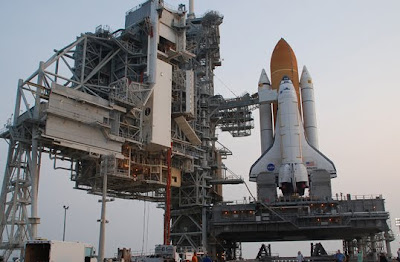 Space shuttle Atlantis stands at launch pad 39A
