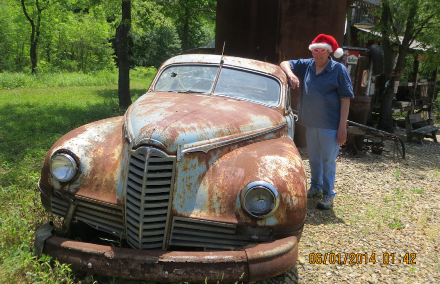 Bad Santa with a Weird old Packard.