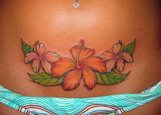 Hawaiian Flower Tattoo Design Below Navel