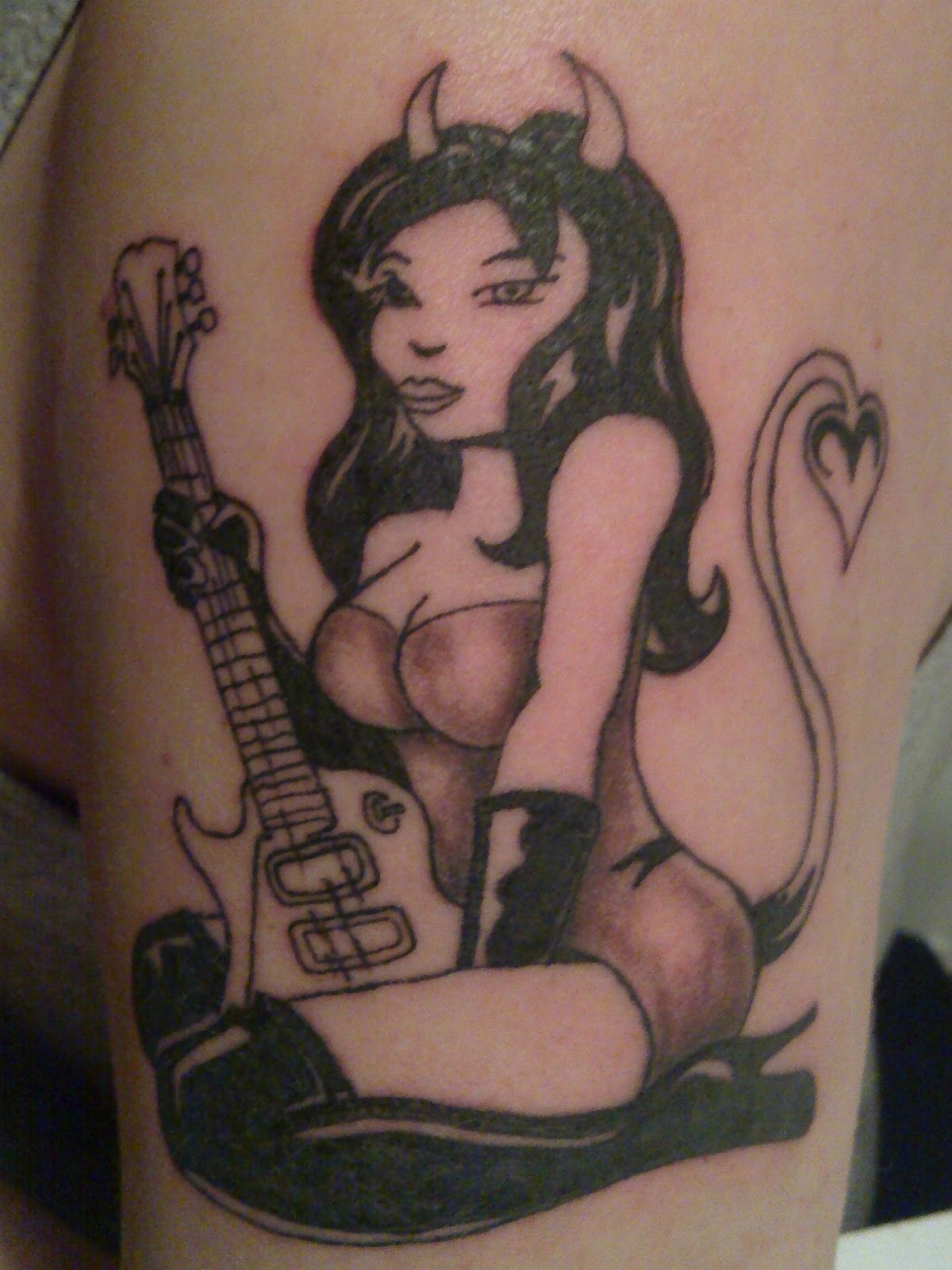http://4.bp.blogspot.com/-pO4l2pvaVXY/T2jzB7vQOeI/AAAAAAAACEA/ubMN7sQkDIE/s1600/Devil_Girl_tattoo.jpg