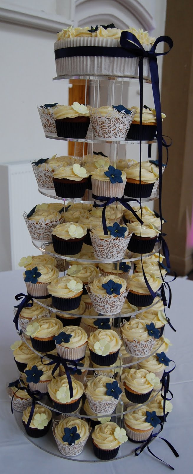 Little Paper Cakes: Navy, yellow and white wedding Cupcake tower