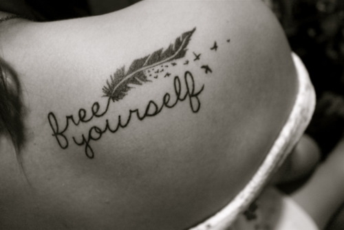 The only thing I don't like about this tattoo is the handwriting font