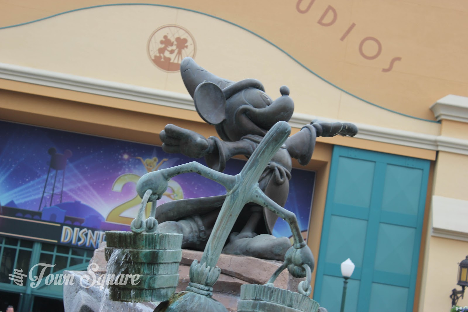 Mickey Mouse statue based on Sorcerers Apprentice from Fantasia with Disney Studio 1 in the background Sorcerer Mickey Statue