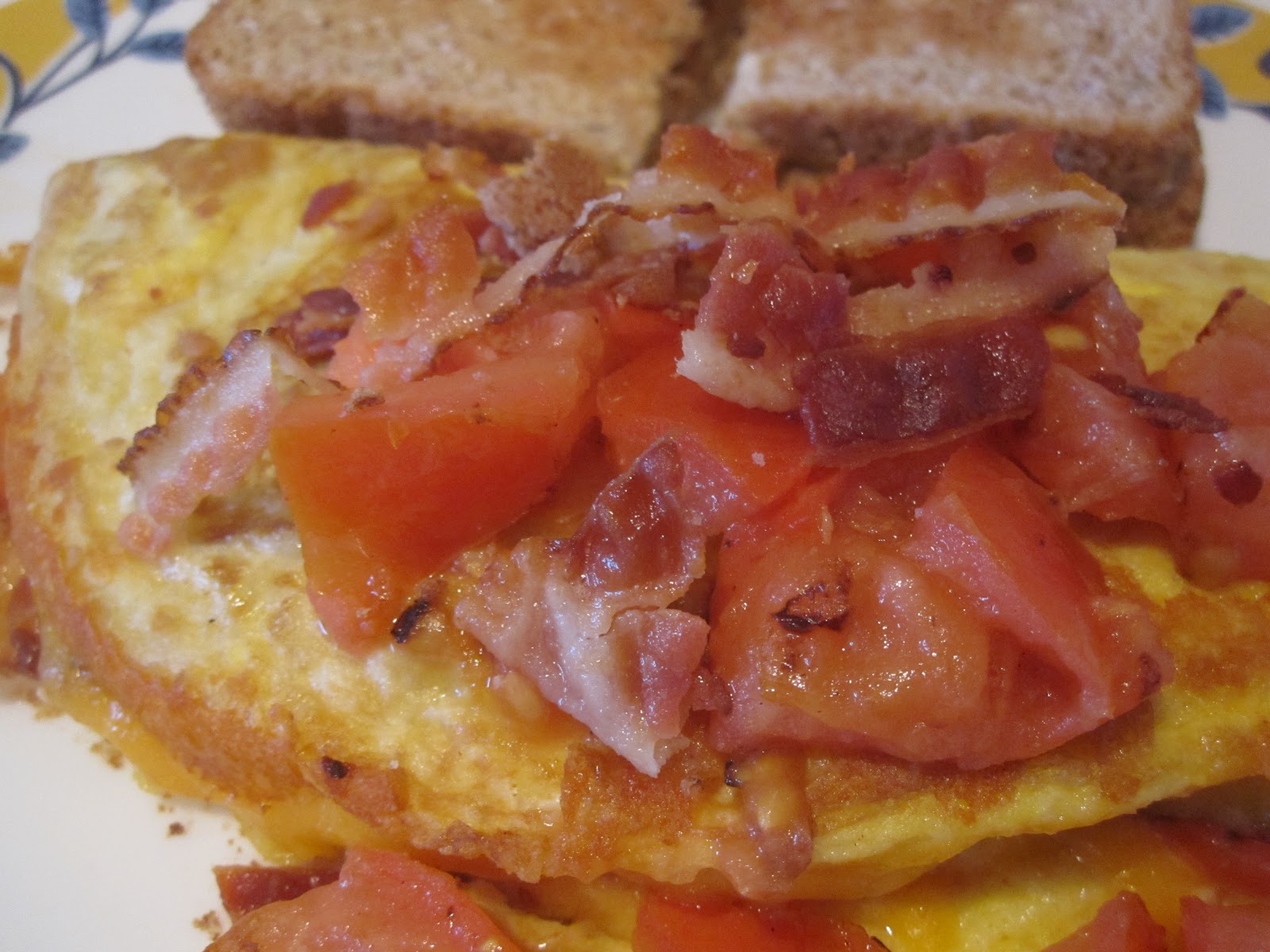 Neighbor Julia Tomato, Bacon and Cheddar omelet