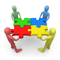 Source: http://joshlowryblog.wordpress.com/2011/04/01/collaboration-2-2-5/ group collaborating with puzzle