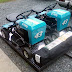 there is only one guy in the world with a pair of Petty Riding Lawnmowers, and the lucky so n so has the signature and photo of Richard Petty himself signing them... that, is pretty damn cool