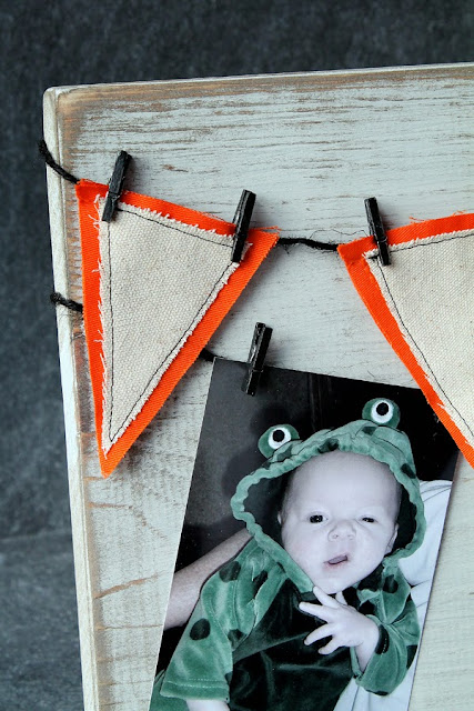 Make this fun and festive Halloween Photo Display to show off pictures of your little ones all dressed up in their costumes! A great piece of decor to bring out year after year!