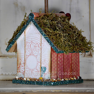 the Little Birdie goes Tweet, Tweet (back) Tammy @ Not Just Paper and Glue Birdhouse; P K Glitz; Glitter; Sticky Tape; Moon Dust; Picture holder; Patterned Paper; Embossing Powder; Not Just Paper and Glue; Tutorial