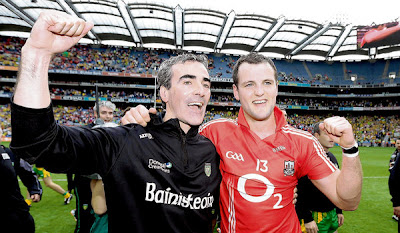 Donegal manager Jim McGuinness and Michael Murphy celebrate after the win at Croke Park on Sunday.