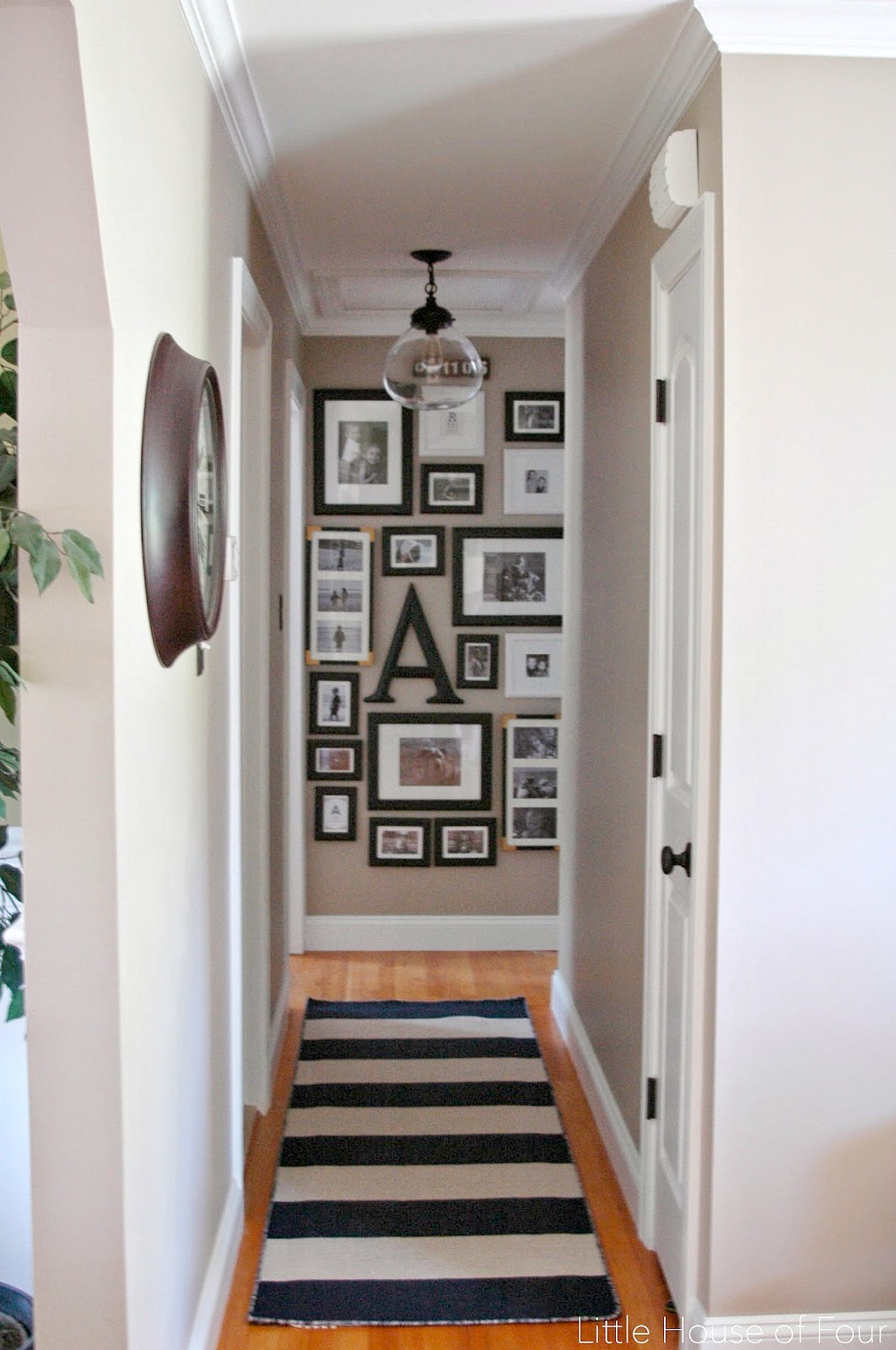 Updated Hall Gallery Wall | Little House of Four - Creating a beautiful