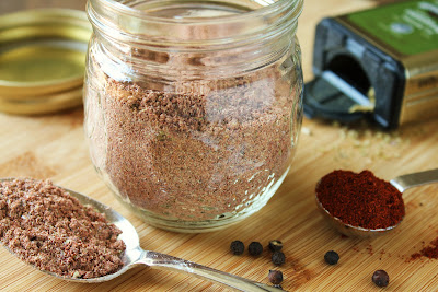 taco seasoning in jar with black pepper, chilli powder and oregano