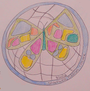 Colorful drawing of a circular spider web with a butterfly captured in it