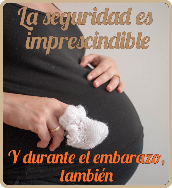 Tripa de embarazada con rótulos "la seguridad es un imprescindible y durante el embarazo también"