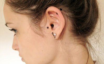 Piercing na Orelha Fotos de Piercing na Orelha