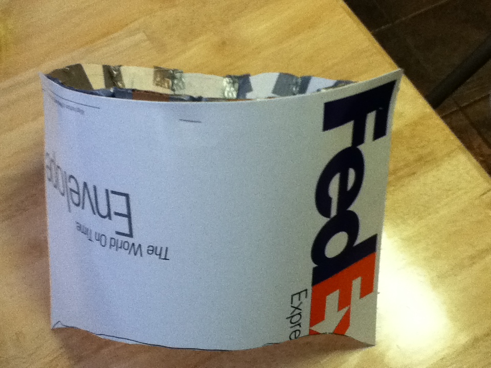 Upcycle Us Buzz lightyear costume for halloween made of UPS and Fedex