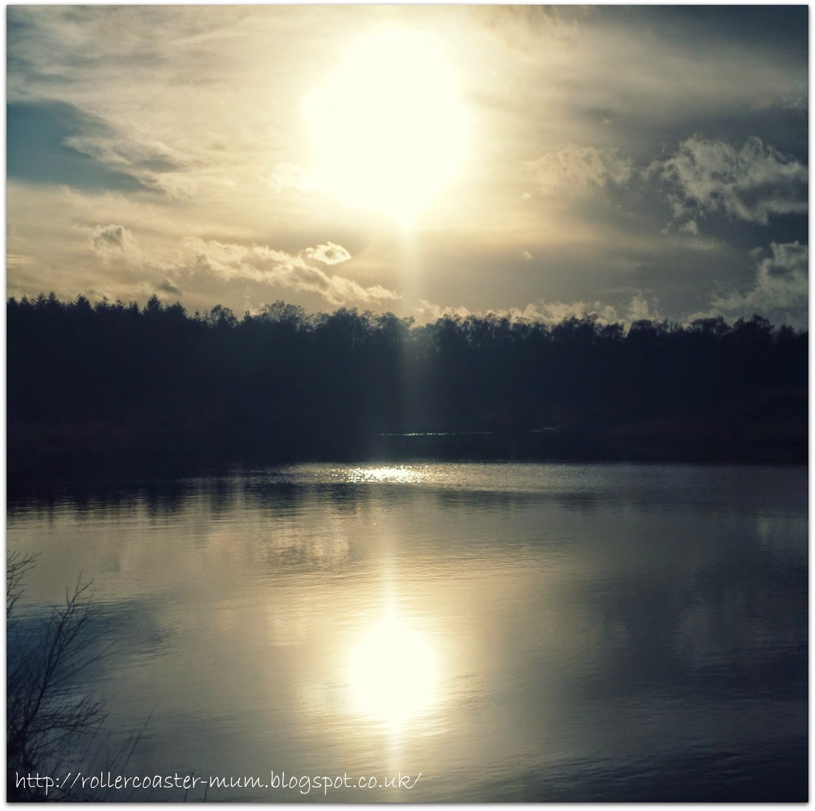 winter sun through clouds winter sun on the lake