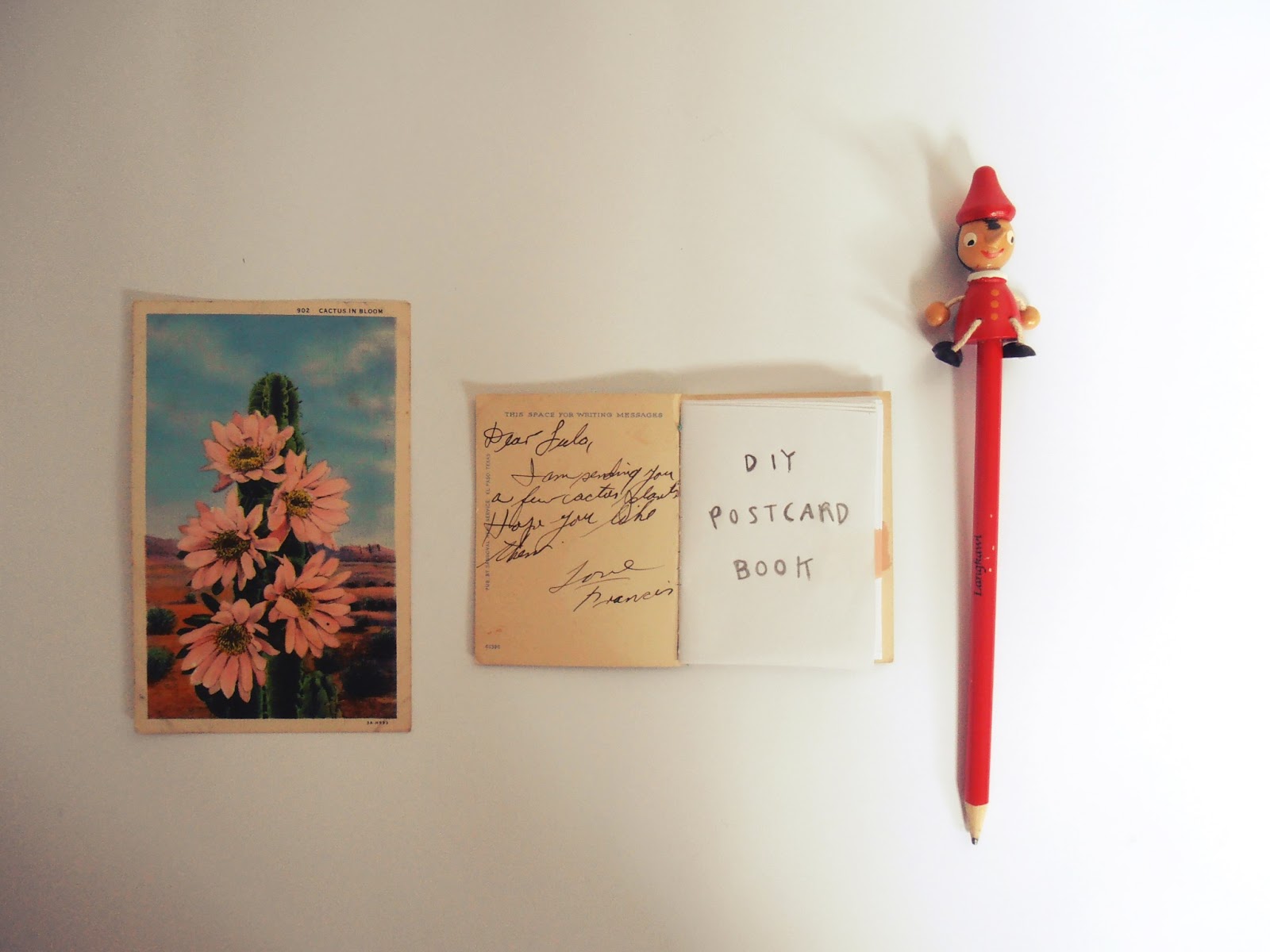 Thimble DIY mini notebook from postcard