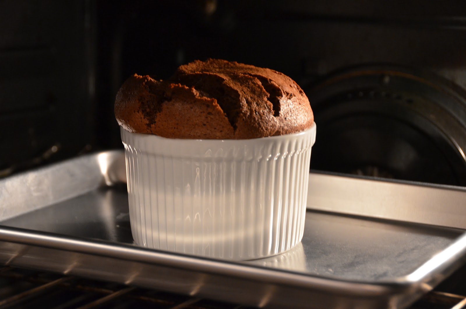 Playing with Flour Chocolate soufflé with orange crème anglaise