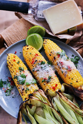 Zesty and flavorful grilled corn on the cob recipe adapted from www.fingerforkknife.com