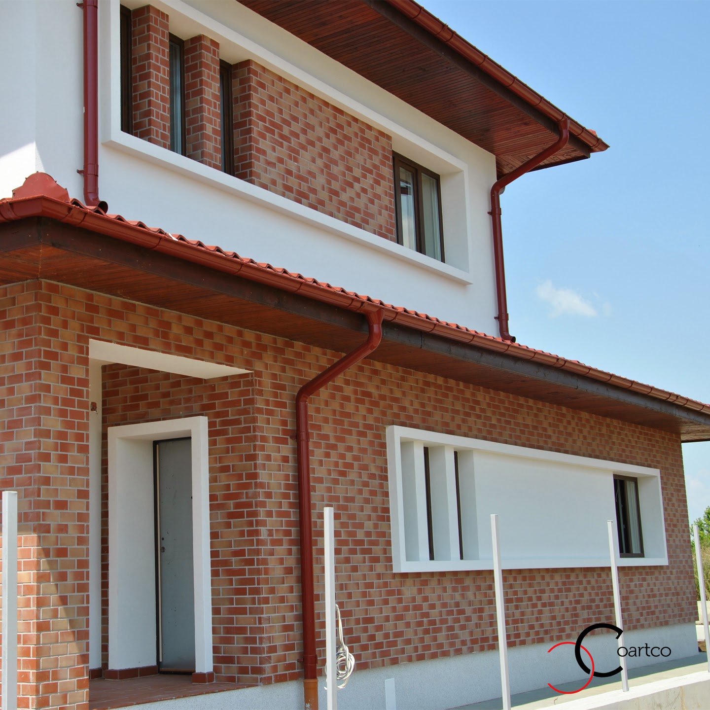 profile decorative, ancadramente polistiren fatada casa cu ancadramente simple din polistiren si placata cu caramida aparenta