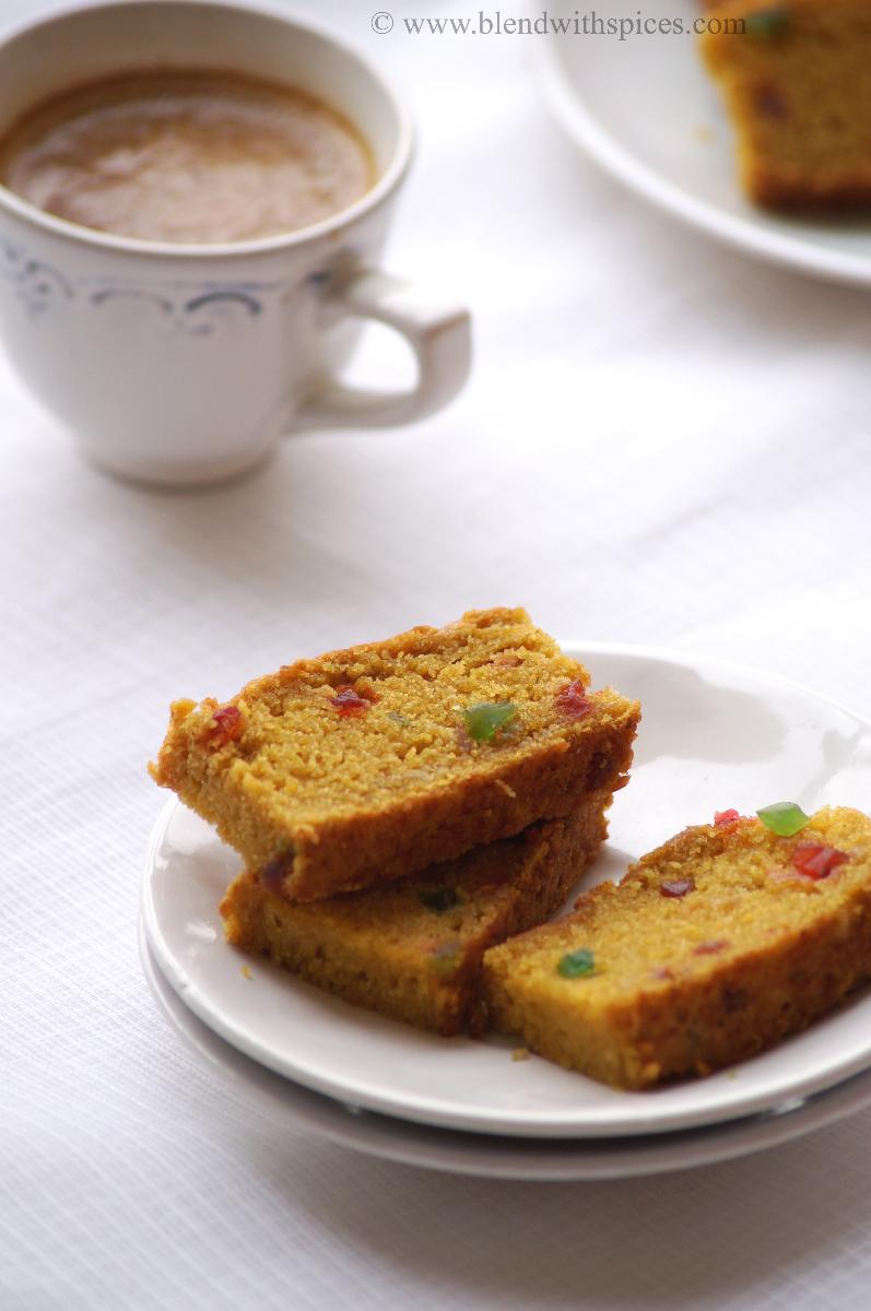 Vegan Mango Tutti Frutti Cake Recipe Vegan Mango Candied Fruit cake with wheat flour, how to make vegan cakes, how to make eggless cake
