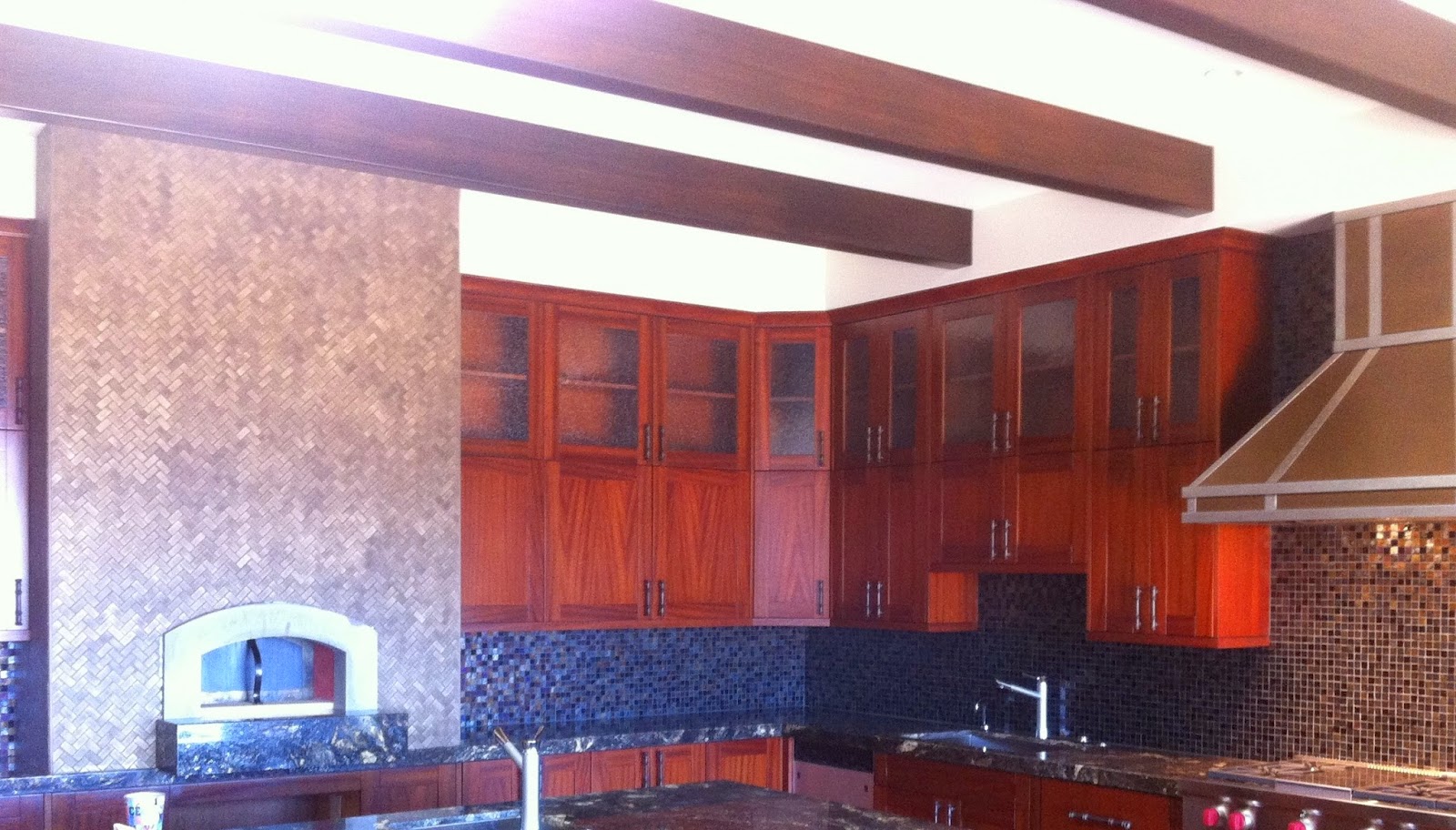 Herringbone kitchen backsplash Kaanapali Lanikeha Tuscan Kitchen, backsplash is Oceanside Glass Tile