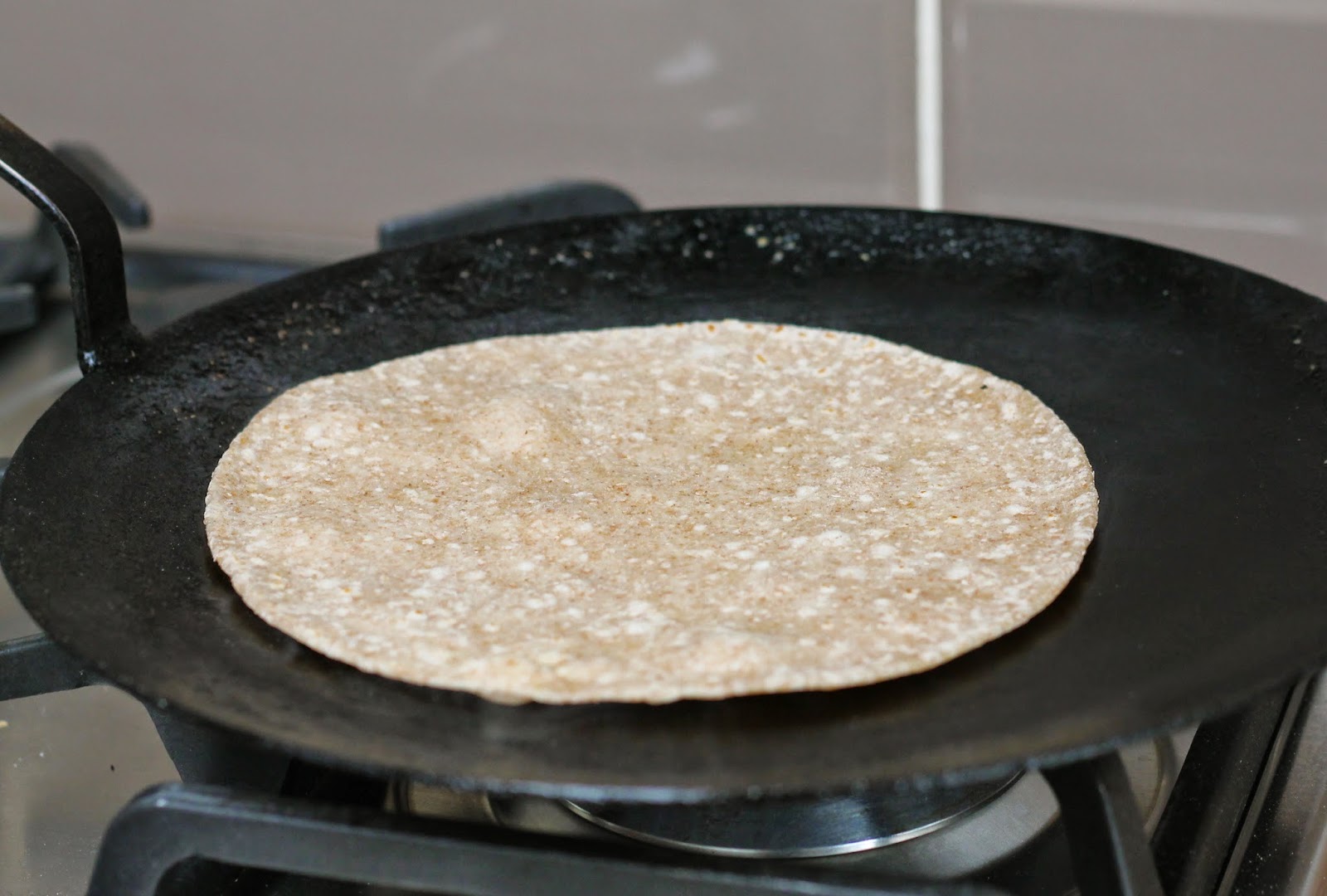 Roti cooking on the stove