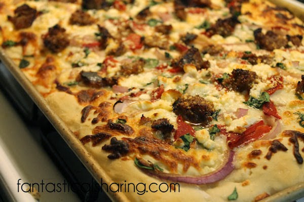 Cherokee Street Pizza | This pizza is just bursting with different flavors from spicy sausage to tart feta cheese!