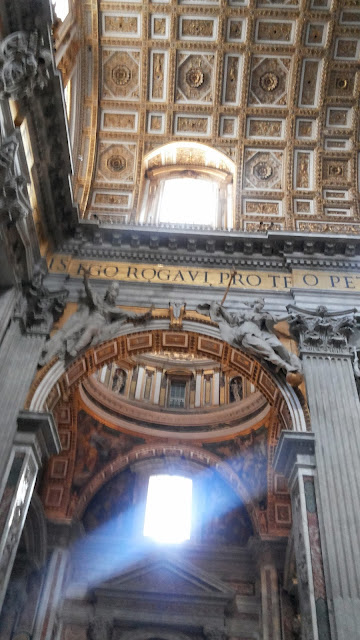 « Light streaming into St Peter's Basillica. »