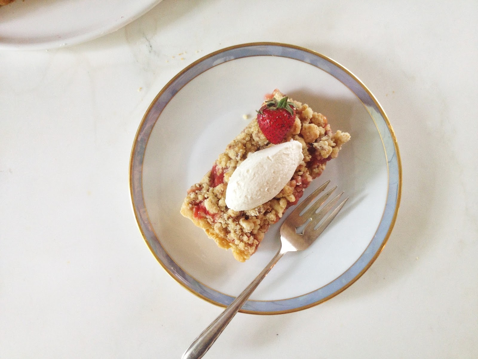 StrawberryRhubarb Crumble Tart with Whipped Mascarpone Quenelle
