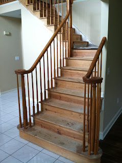 staircase covered with pine tread but damaged by carpet staples. new jersey, nj staircase makeover 1 - removing carpet from pine steps, new jersey, nj