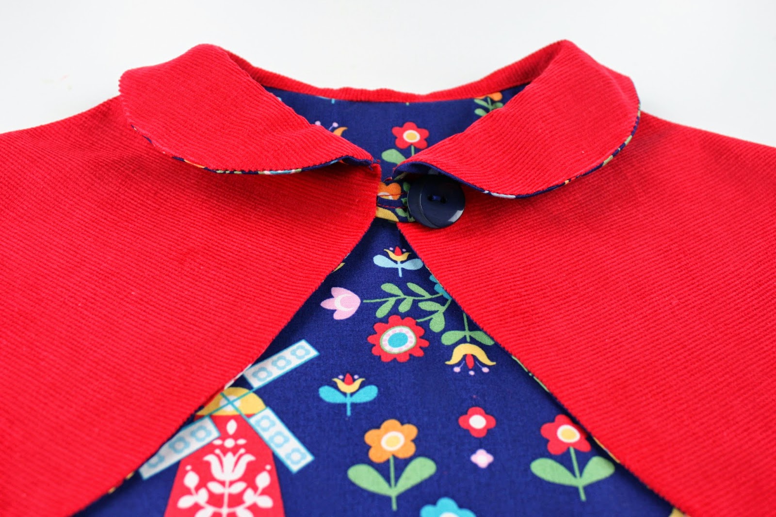 Amelie and Atticus Peter Pan Cape with Button Closure