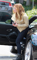 Hilary Duff getting out of her car