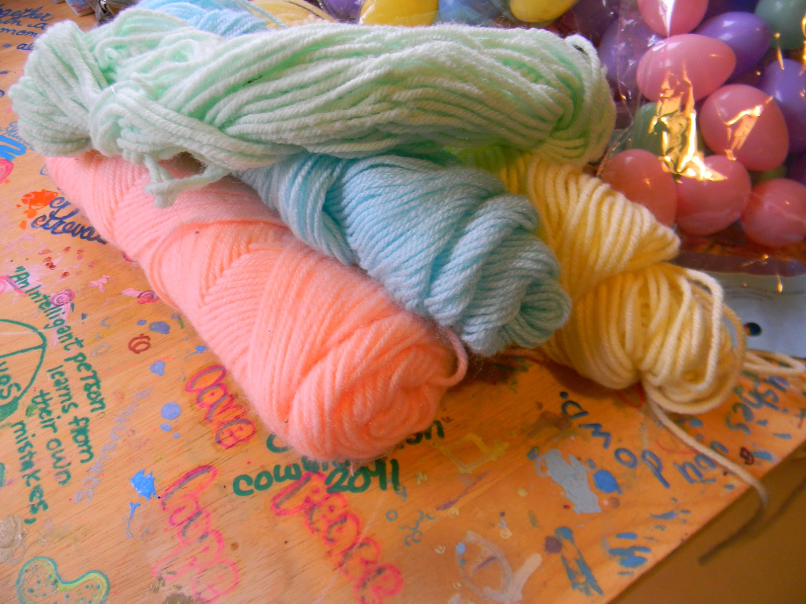 Custom Design's by Nicole Plastic and Yarn Easter Egg Wreath