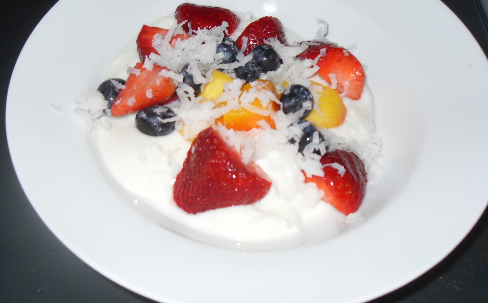the BEAT Eat In. Fresh fruit salad with yogurt and coconut.