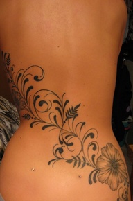 FLOWER ON HORIZONTAL BACK BODY Female tattoo