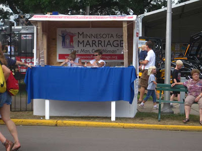 Minnesota for Marriage booth, two women sitting behind the table