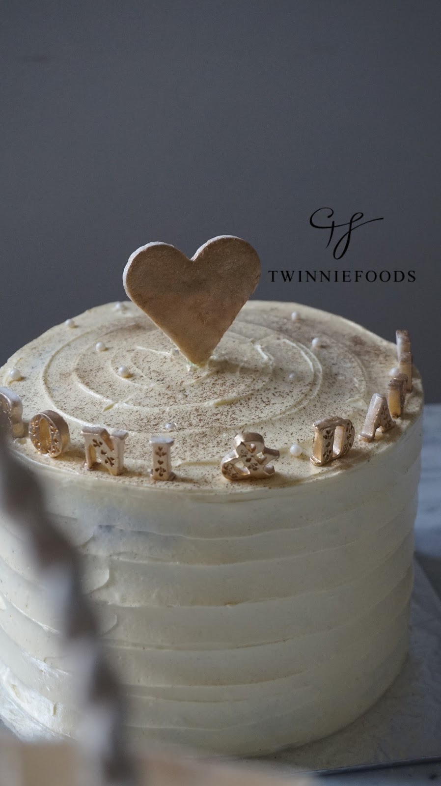 Minimalistic white and gold Wedding Anniversary cake TwinnieFoods